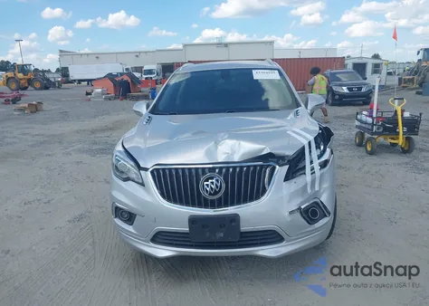 2018 Buick Envision Essence z USA, uszkodzony, nr VIN LRBFX1SA4JD027552